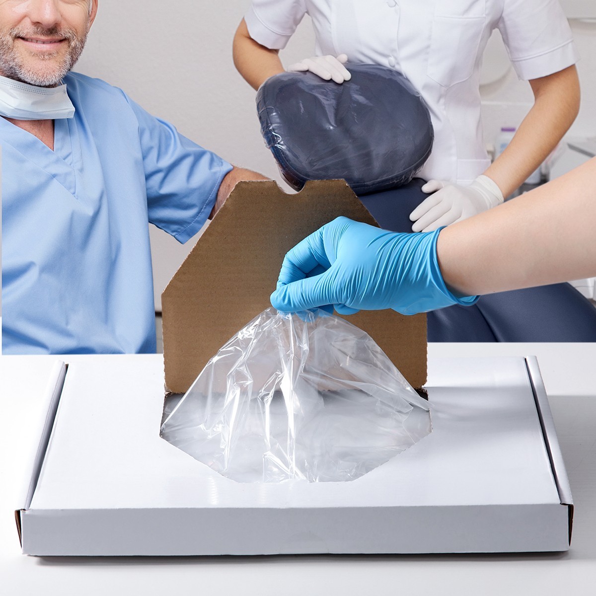 250/box Disposable Headrest cover Chair Sleeve Plastic Dental Cover 10″ x 14″