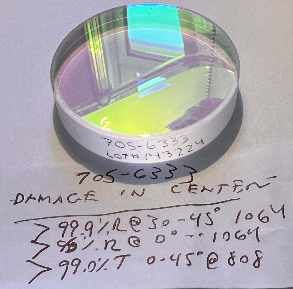 CVI Ø2″ Flat mirror HR 99.9% @ 1064nm 30-45°, HT 99% @ 808nm 0-45° Tested