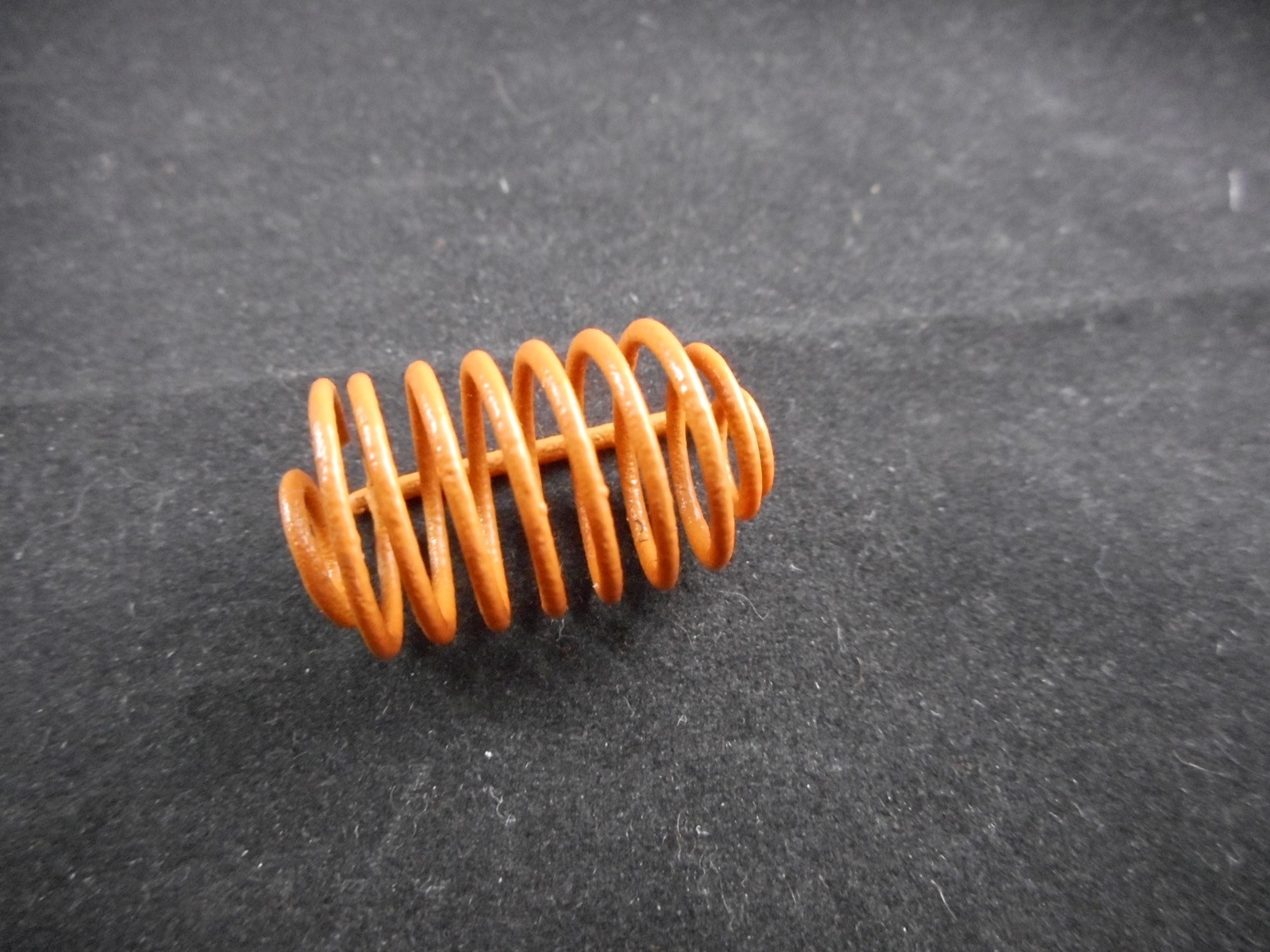 QLA Spiral Capsule Sinker Orange Coated Music Wire 6.5 Coils 1.10″ L x .41” W B