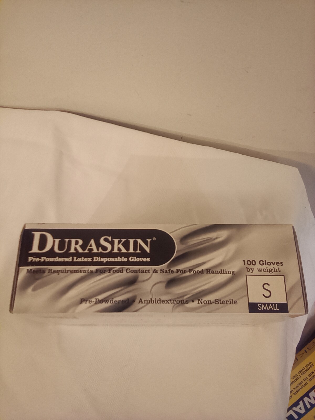Duaskin pre-powered latex disposable gloves 100 ct item # 2899W/S small NWOT