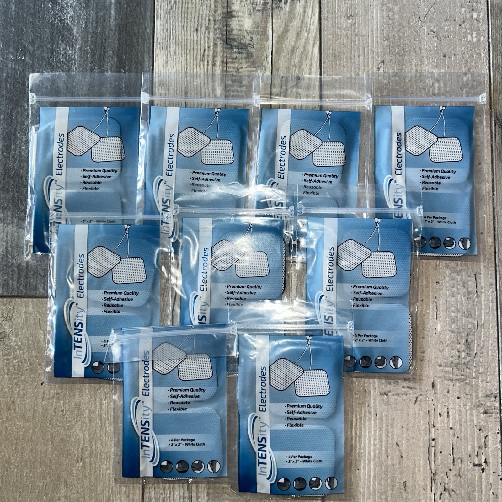 9 packs InTENSity Electrodes 2″x2″ Tens unit Premium reusable 4 pads per pack