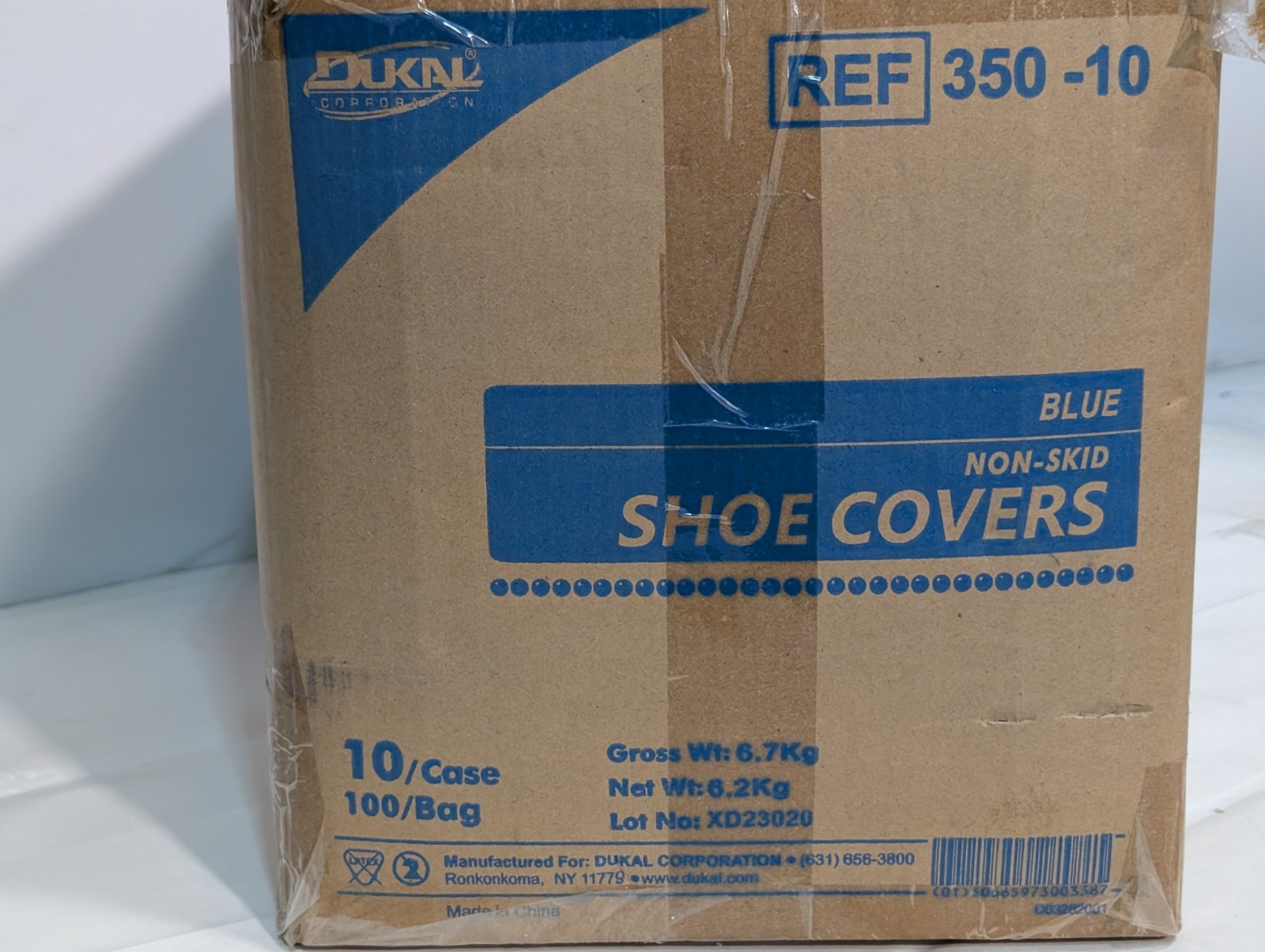 Box of 1000 DUKAL REF 350-10 blue non-skid shoe covers, disposable, as shown