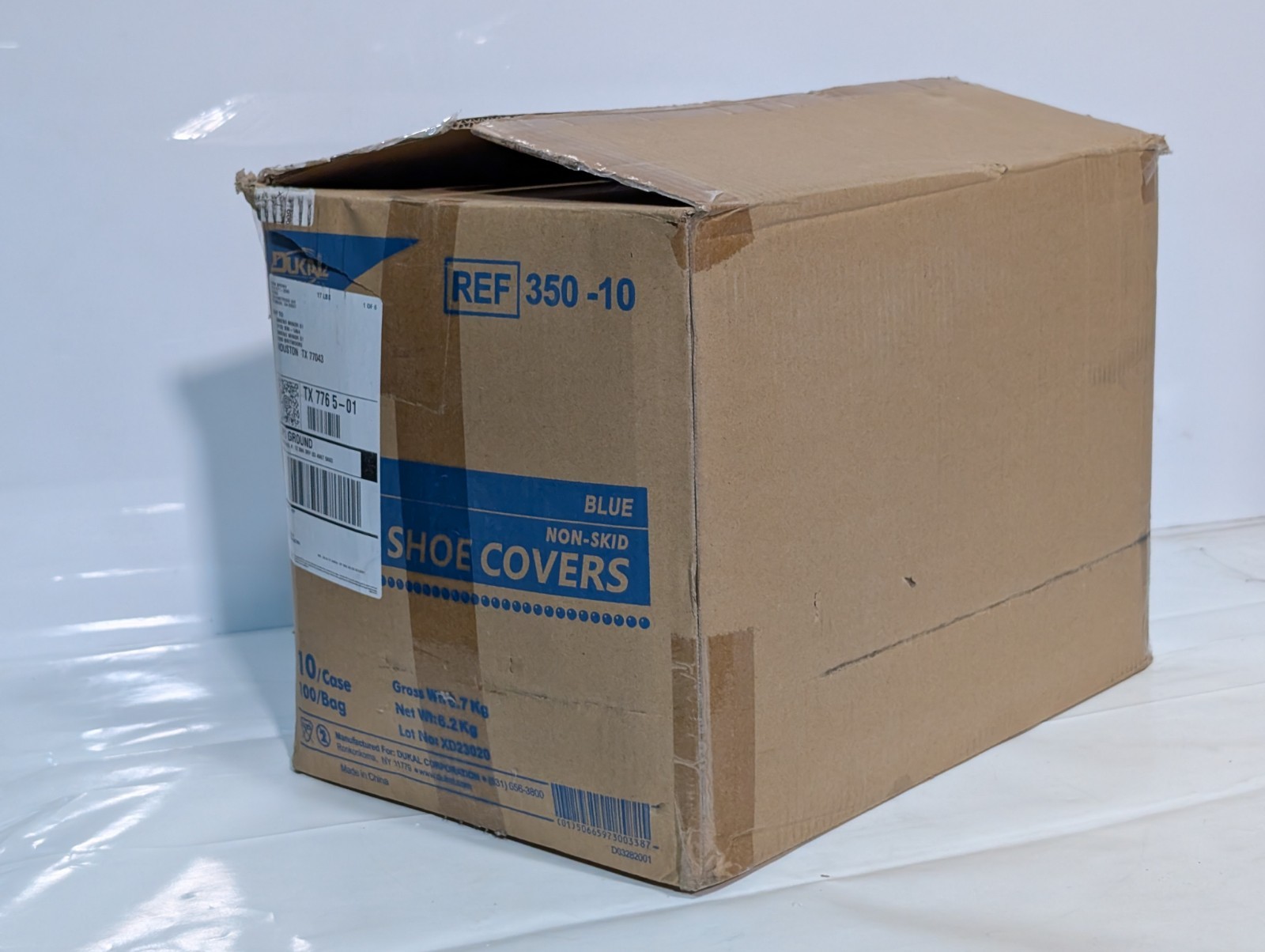 Box of 1000 DUKAL REF 350-10 blue non-skid shoe covers, disposable, as shown