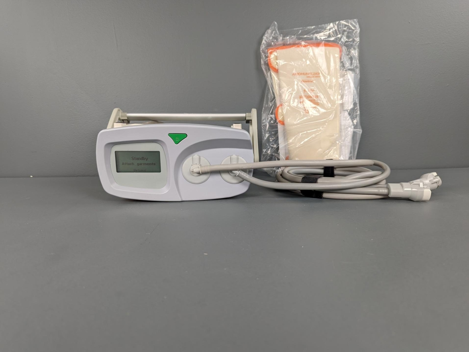 Huntleigh Flowtron Universal AC600 DVT Pump with Warranty & Medium Calf Garments