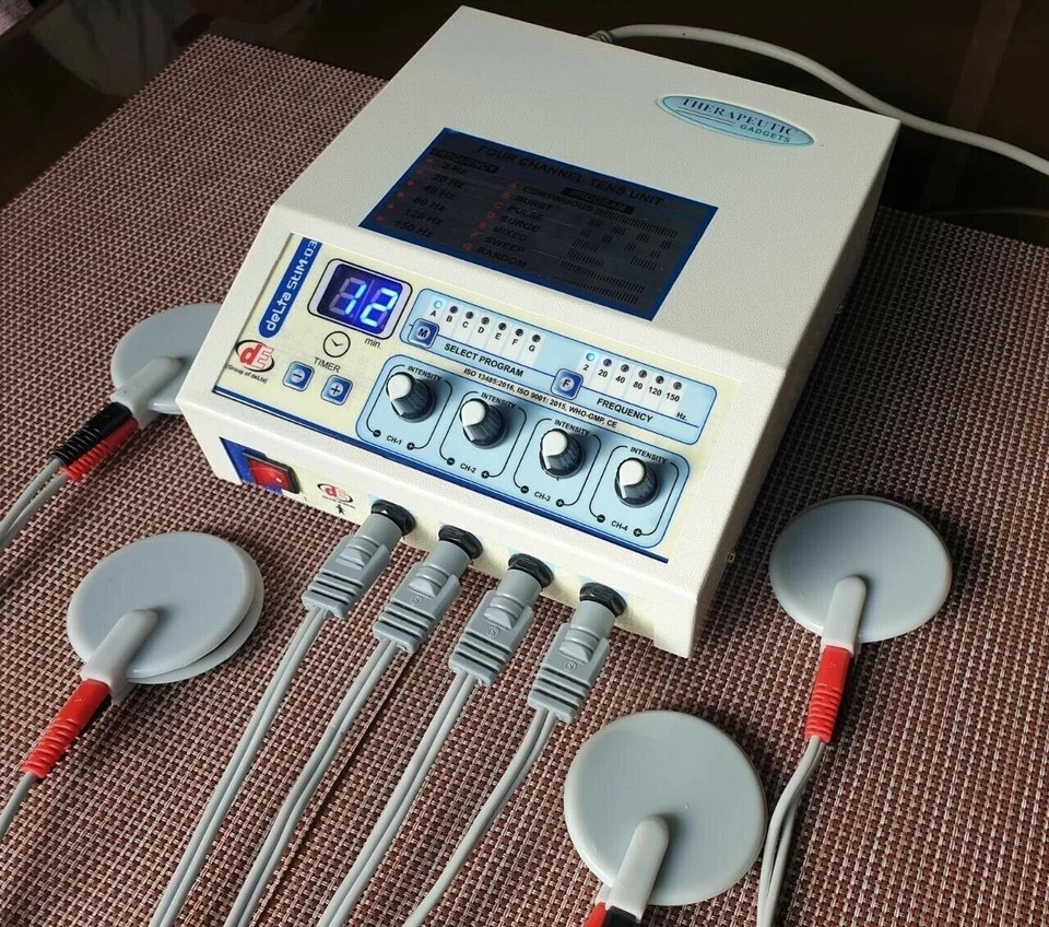 Branded Electrotherapy Machine With 4 Channel Unit Sticky + Carbon Pads .