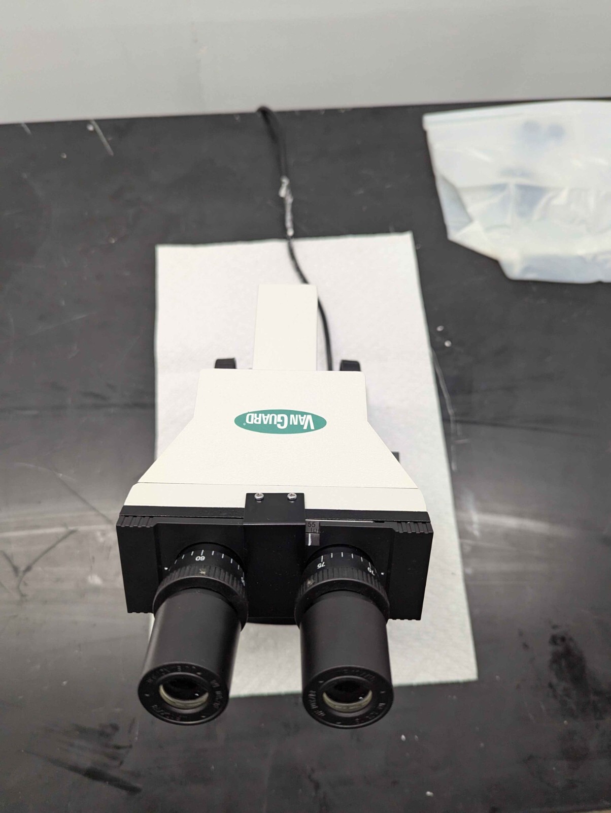 VanGuard Clinical Microscope 1113AML with 4 objectives.